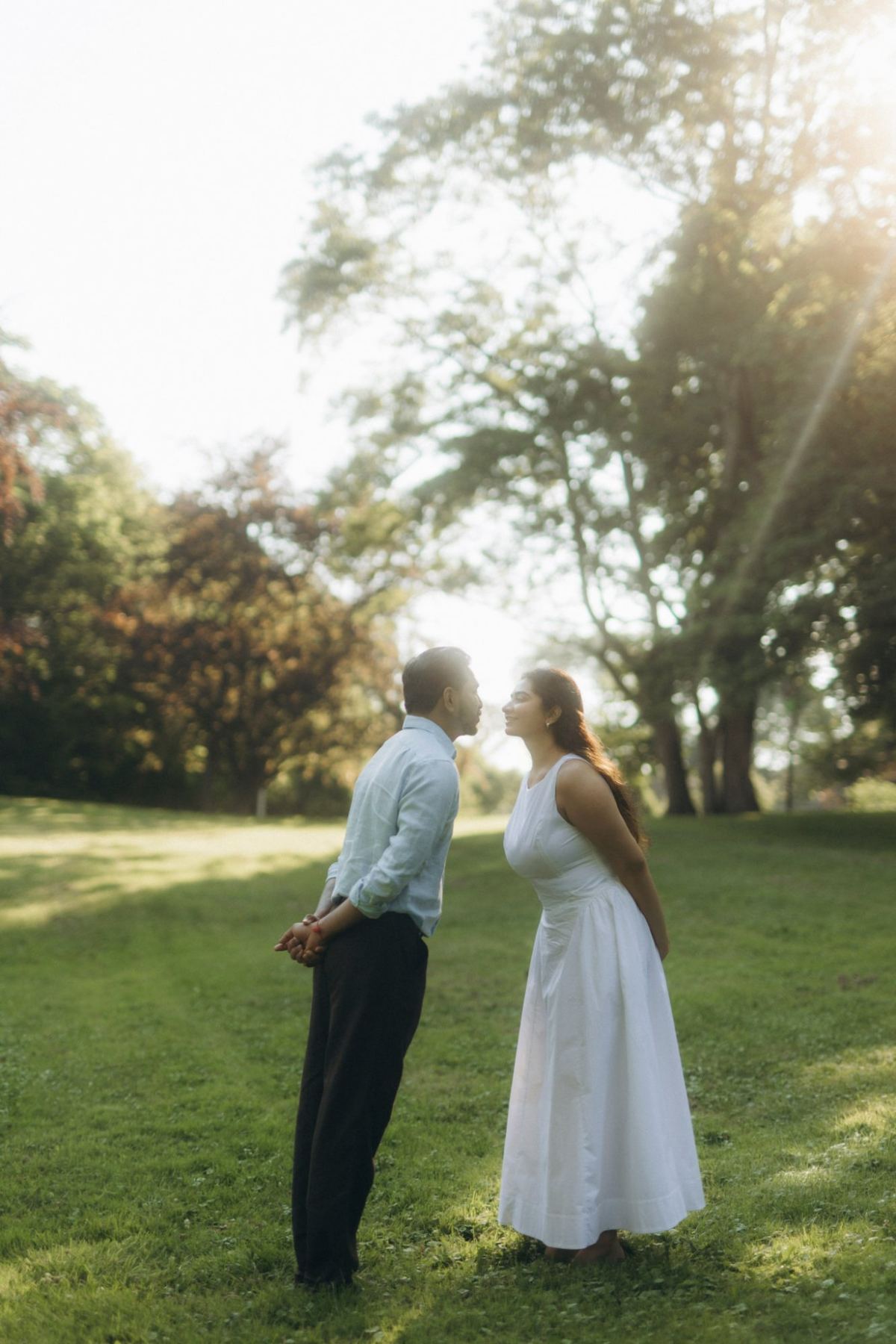 Arya and Manthan leaning toward each other at sunset, e-shoot styling by Bhoomi Jani Weddings