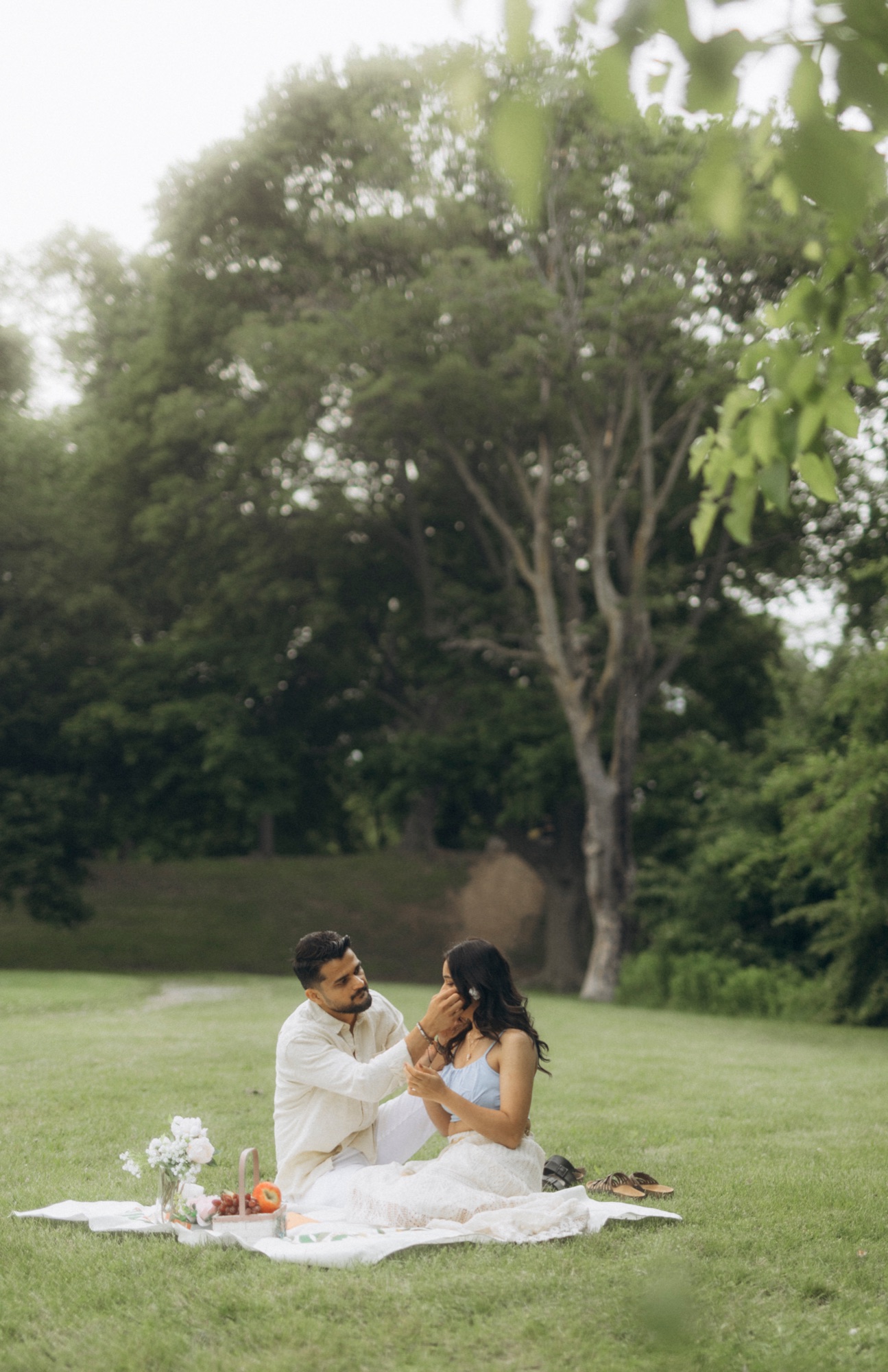 Bride in a black floral tulle dress crossing a Yorkville street in Toronto, e-shoot styling by Bhoomi Jani Weddings